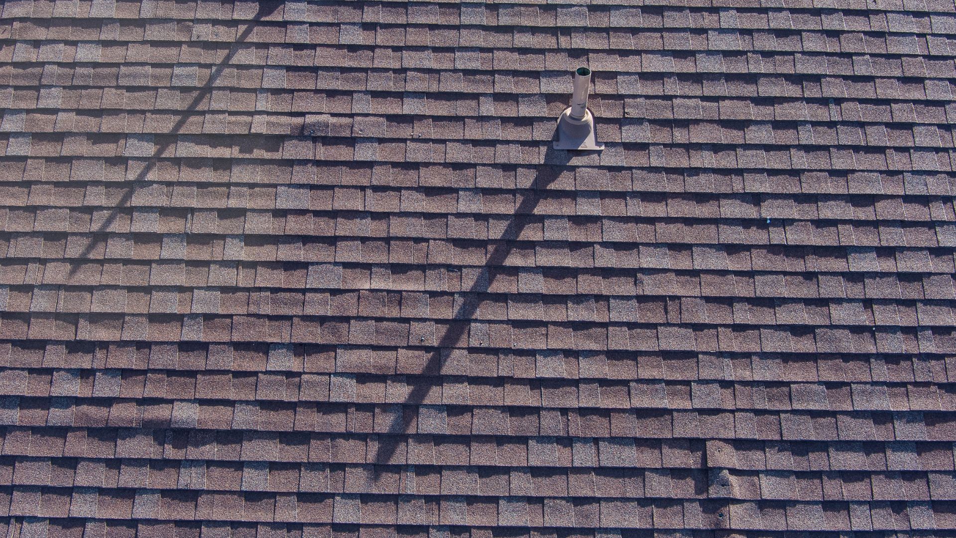 Featured image for “The Hidden Damage Hail Leaves on Sterling Roofs (And Why You Need a Free Inspection)”